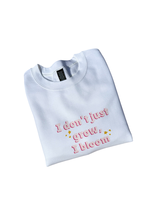 I don’t just grow, I bloom crewneck