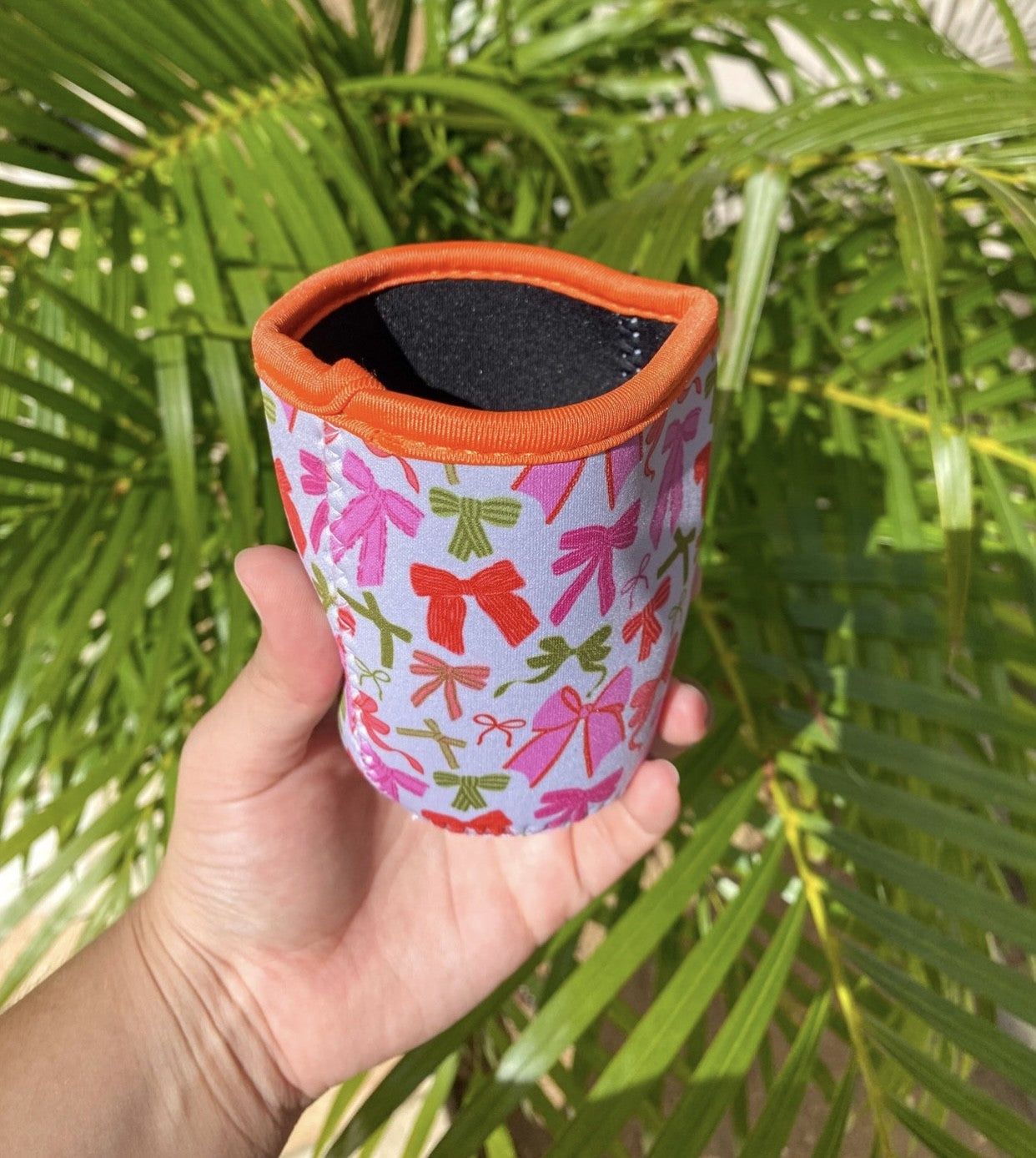 Cutesy ribbon cup sleeve