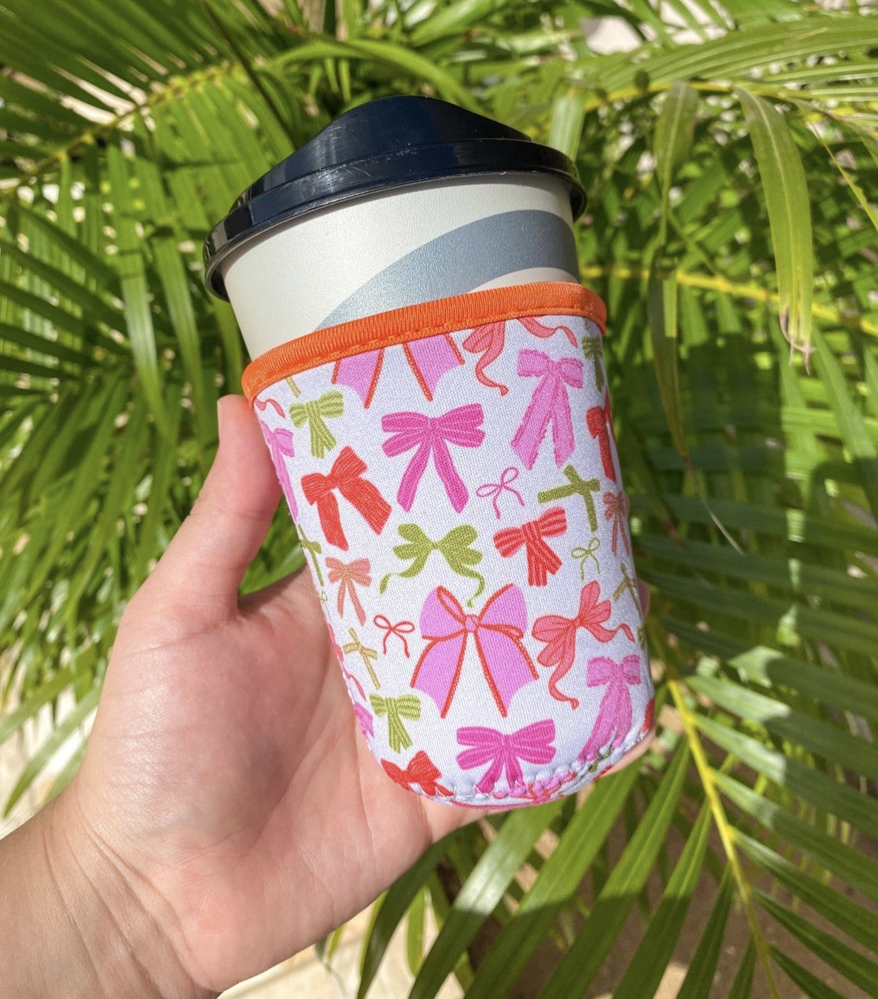 Cutesy ribbon cup sleeve